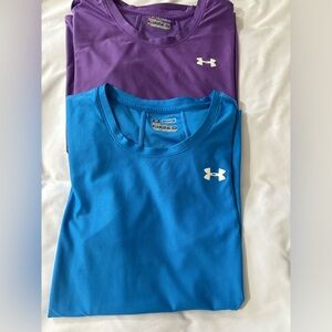 2 Womens Under Armor heat gear shirts Blue shirt has a small pull see photo